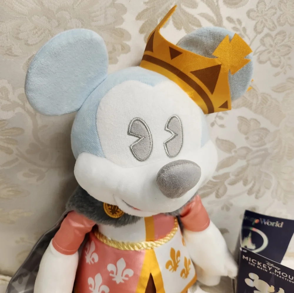 Disney parks 50th Mickey Mouse the main attraction Prince Charming regal